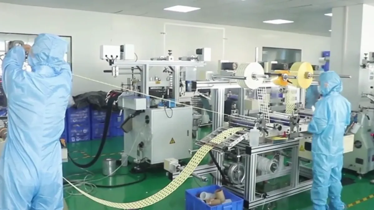 Cleanroom production line running nasal strip manufacturing at volume